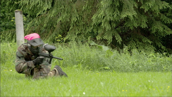 A Man Shooting Some Target with the Paintball