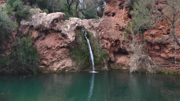 Pego do Inferno waterfall drone aerial view in Tavira Algarve, Portugal