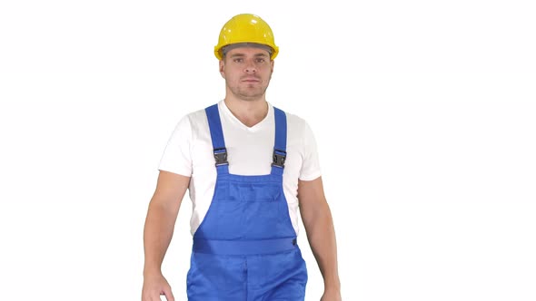 Walking Worker in Yellow Helmet on White Background.