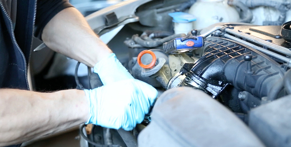 Mechanic Repairing a Car
