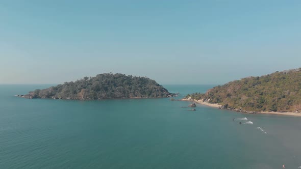 Palolem Island Reserve in the edge of Palolem Beach in Goa, India - Aerial Panoramic Orbit shot