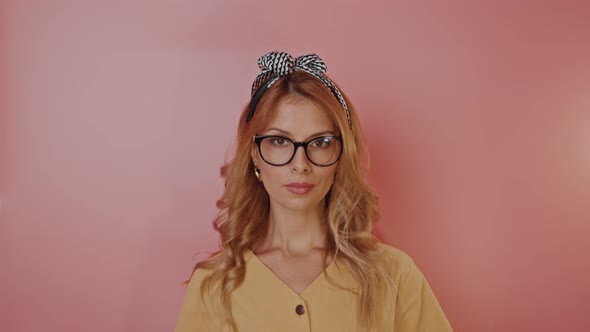 Portrait of a Pretty Young Blonde Woman in Retro Style