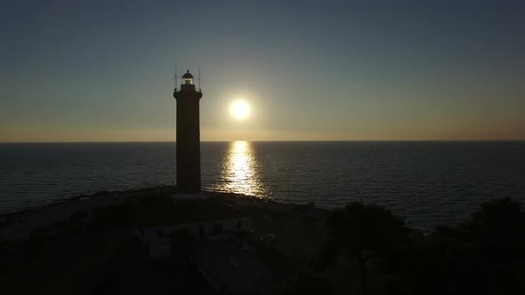 Tracking shot of lighthouse, Croatia at sunset