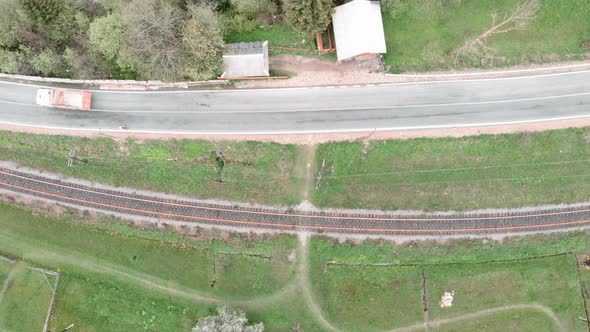 Top view of railway road and car road. Transportation concept. Roads in mountains