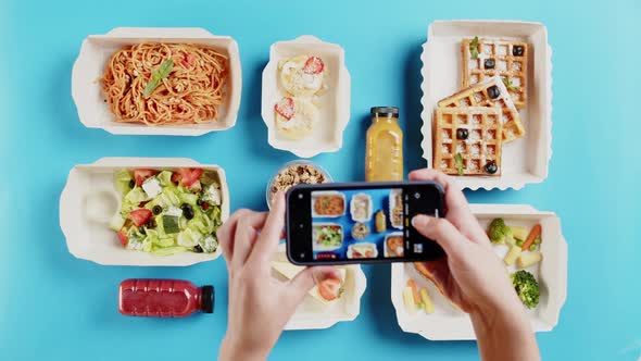 Food Delivery Top View Take Away Meals in Disposable Containers on Blue Background