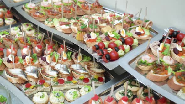 Catering banquet table with snack in restaurant or hotel. Catering service, food set