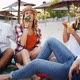 Group of Happy Friends Having Fun at Beach in Summer - VideoHive Item for Sale
