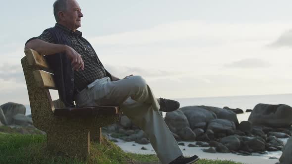 Senior man sitting on a bench