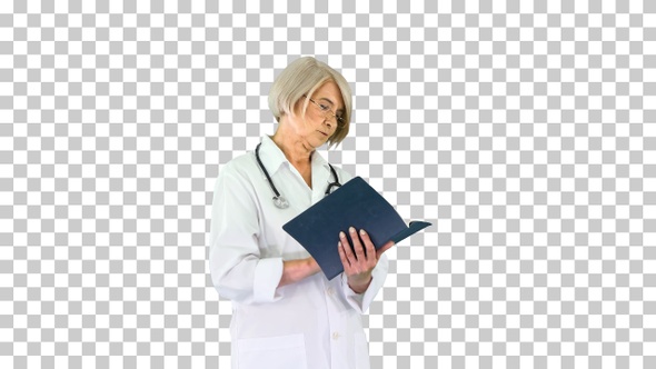 Mature woman doctor with a stethoscope reading log, Alpha Channel