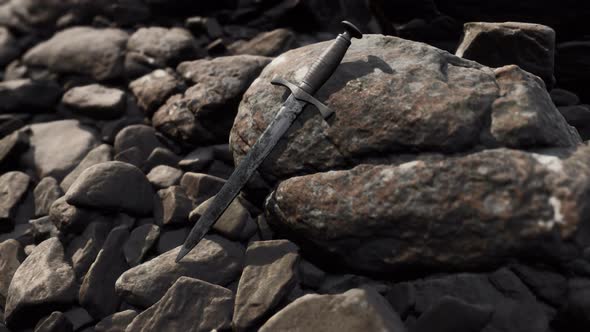 Old Dagger on the Rock at Sunset