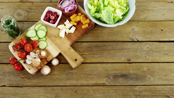 Chopped vegetables on wooden table