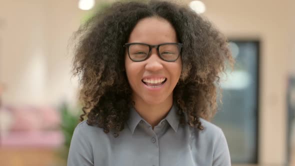 Portrait of Head Shake As Yes Sign By Young African Woman