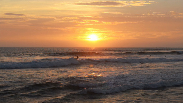 Surfers in Sunset