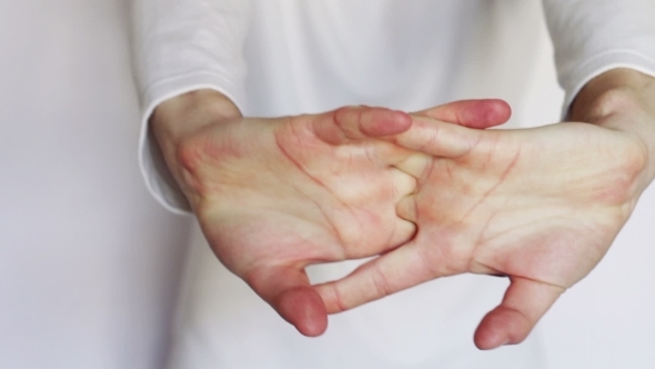 Man Shows Gestures And Signs With His Hands.