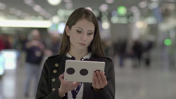 Beautiful Young Caucasian Woman Using Tablet Screen