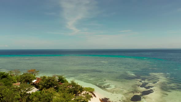 Tropical Island with Sandy Beach. Mantigue Island, Philippines
