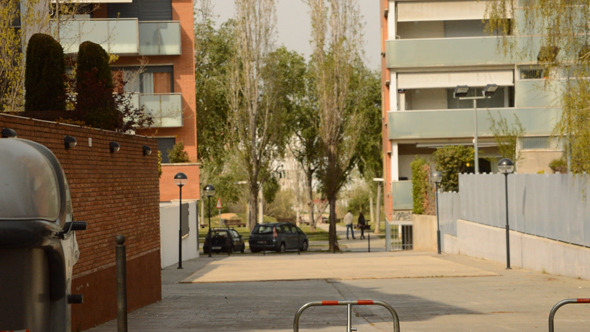 People Walking Near Modern Buildings