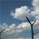 Secured Area With a Tower, a Fence and Barbed Wire - VideoHive Item for Sale