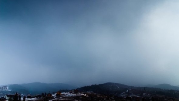 Clouds Moving Over The Mountains