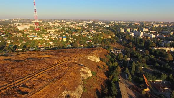 After the Rock with Wasteland, Urban Buildings Begin