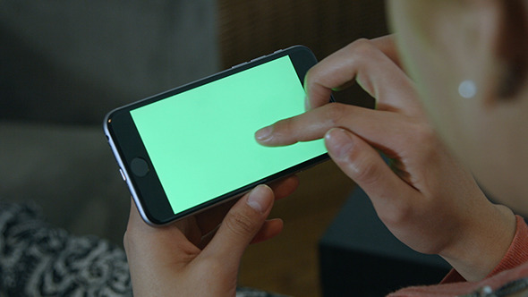 Girl Using Phone with Green Screen