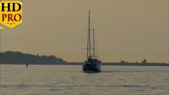 A Small Yacht on Sail on the Ocean