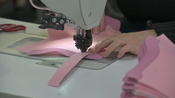 Sewing Together Some Parts of Soft Pink Winter Boot