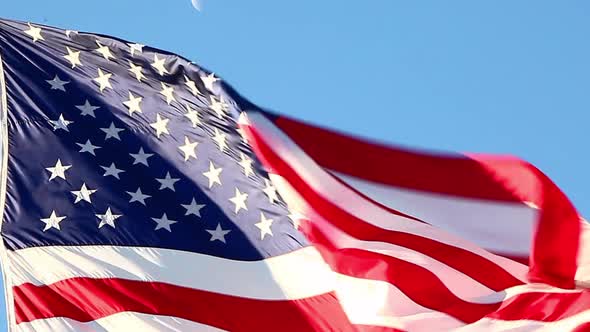 Close-up shot of the American flag flying over the Korean War Veterans Memorial in Washington DC