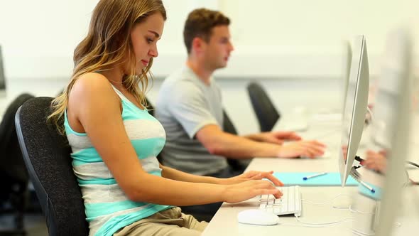 Focused Students Working In Computer Room alt