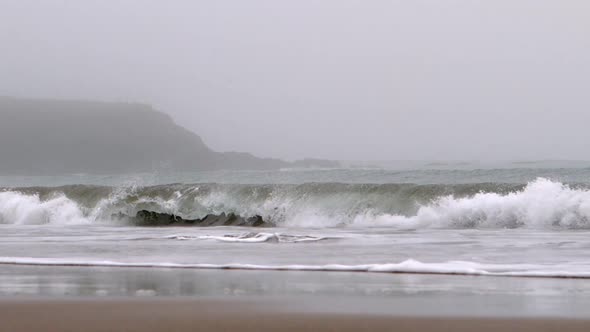 Powerful Wave Crashing On The Beach