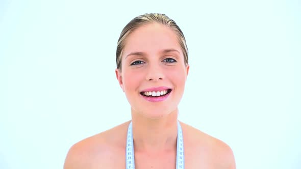 Smiling Woman Giving Thumbs Up alt