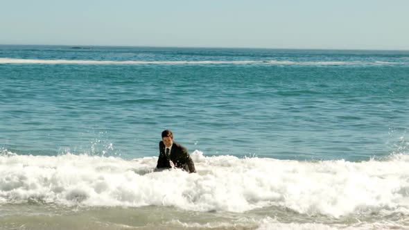 Businessman Walking In The Water