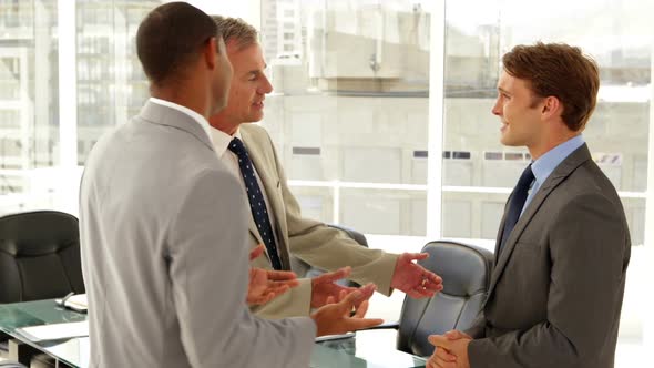 Businessmen Talking Together