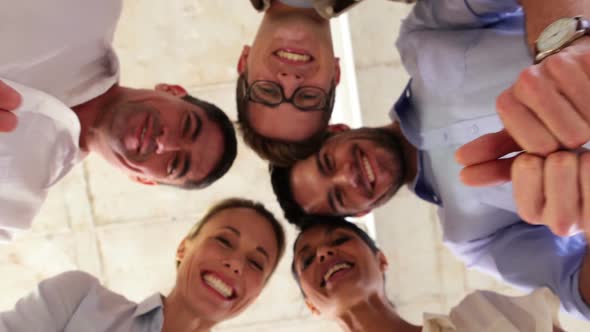 Businesspeople Showing Thumbs Up At Camera alt