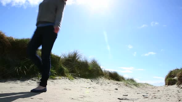 Pretty Woman Walking On The Beach