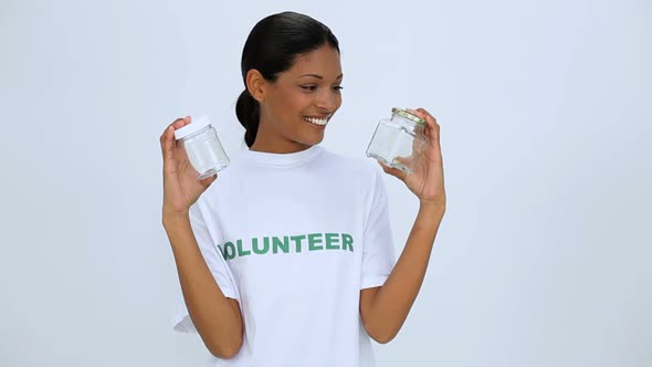 Volunteer Woman Showing Two Jar