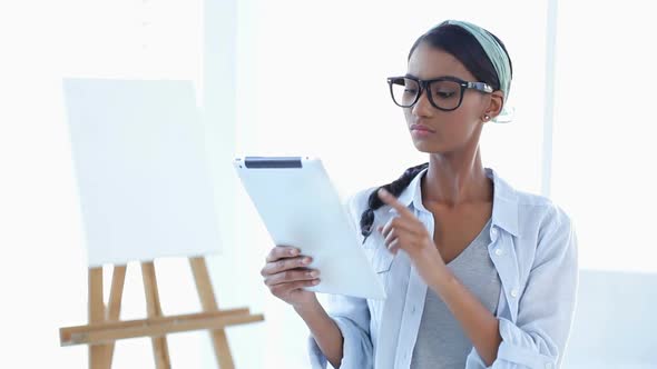 Artistic Woman Using A Tablet