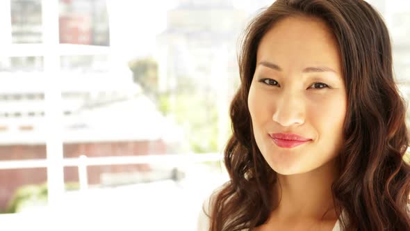 Asian Businesswoman Smiling At Camera alt