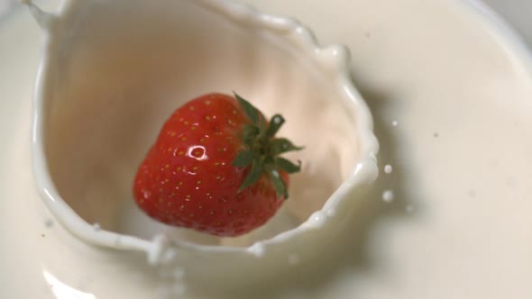 Strawberry Falling In Milk