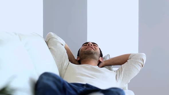 Man Relaxing On The Couch