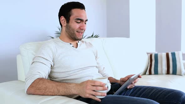 Man Using A Tablet