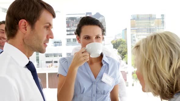 Business People Drinking Coffee And Chatting