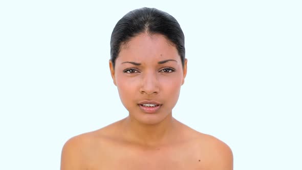 Young Woman Sneezing And Blowing Her Nose alt