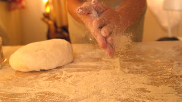 Hands Rubbing Flour Off Each Other While Baking alt