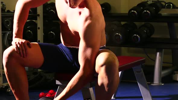 Attractive Fit Man Lifting Dumbbell alt