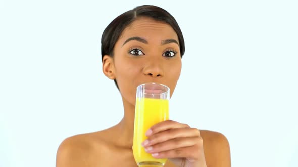Woman Drinking A Glass Of Orange Juice