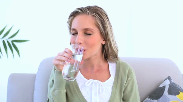 Woman Holding A Glass Of Water