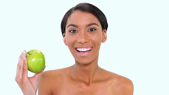 Woman Holding A Green Apple 1