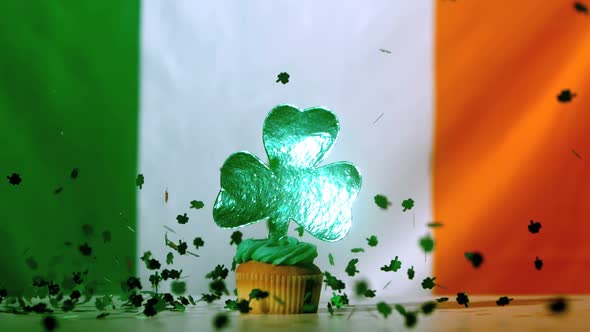 Shamrock Confetti Falling On St Patricks Day Cupcake