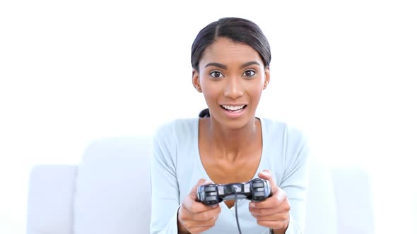 Woman Playing And Winning At Video Games